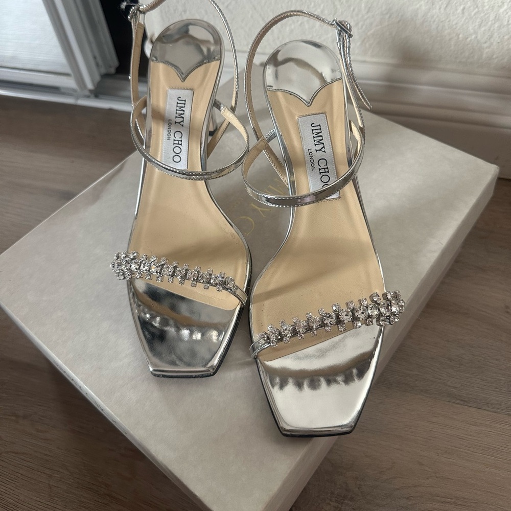 JIMMY CHOO
Meira 85 crystal-embellished mirrored-leather slingback sandals 39.5